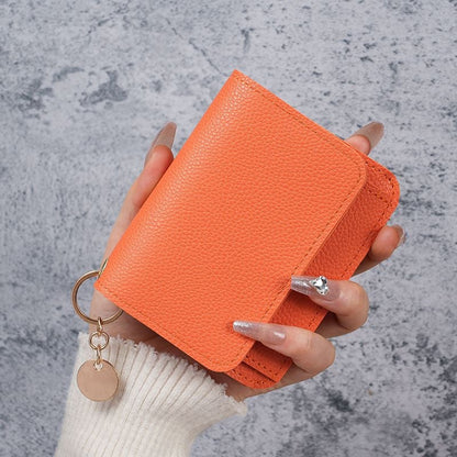 Elegant and Minimalist Women's Slim Short Wallet – with card slots, a bill compartment, and an ID window
