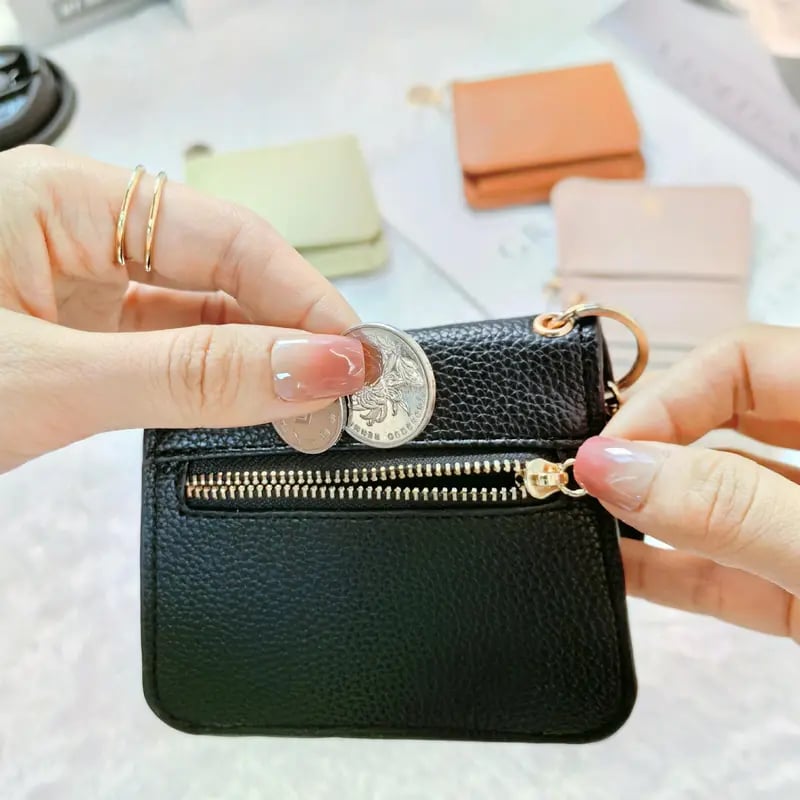 Elegant and Minimalist Women's Slim Short Wallet – with card slots, a bill compartment, and an ID window
