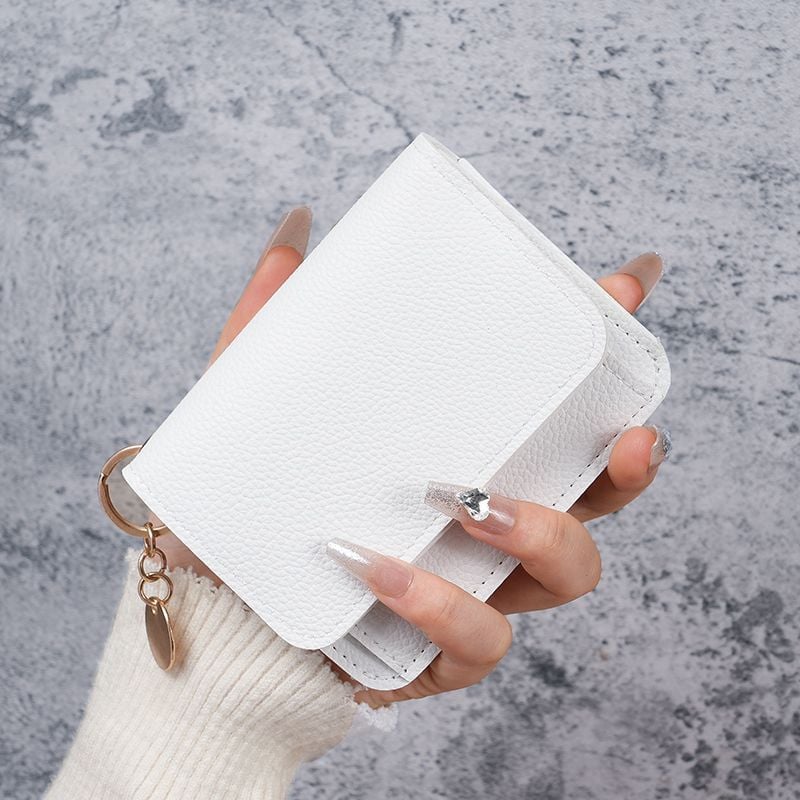 Elegant and Minimalist Women's Slim Short Wallet – with card slots, a bill compartment, and an ID window