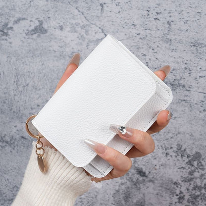 Elegant and Minimalist Women's Slim Short Wallet – with card slots, a bill compartment, and an ID window