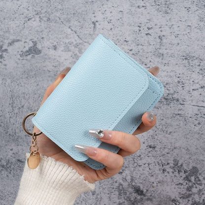 Elegant and Minimalist Women's Slim Short Wallet – with card slots, a bill compartment, and an ID window