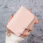 Elegant and Minimalist Women's Slim Short Wallet – with card slots, a bill compartment, and an ID window